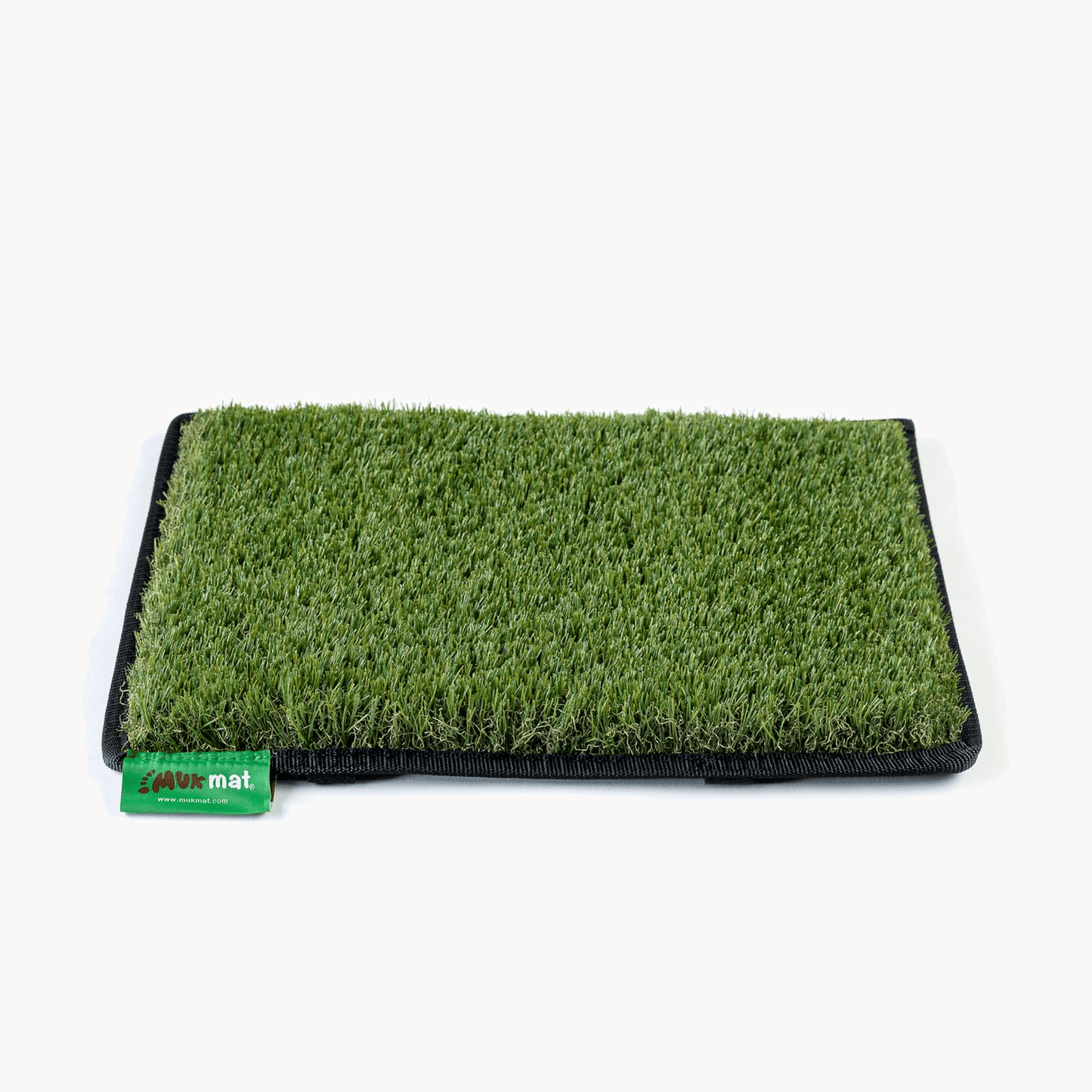 Muk Mat Step — Green, synthetic grass step mat for caravan pull-out steps